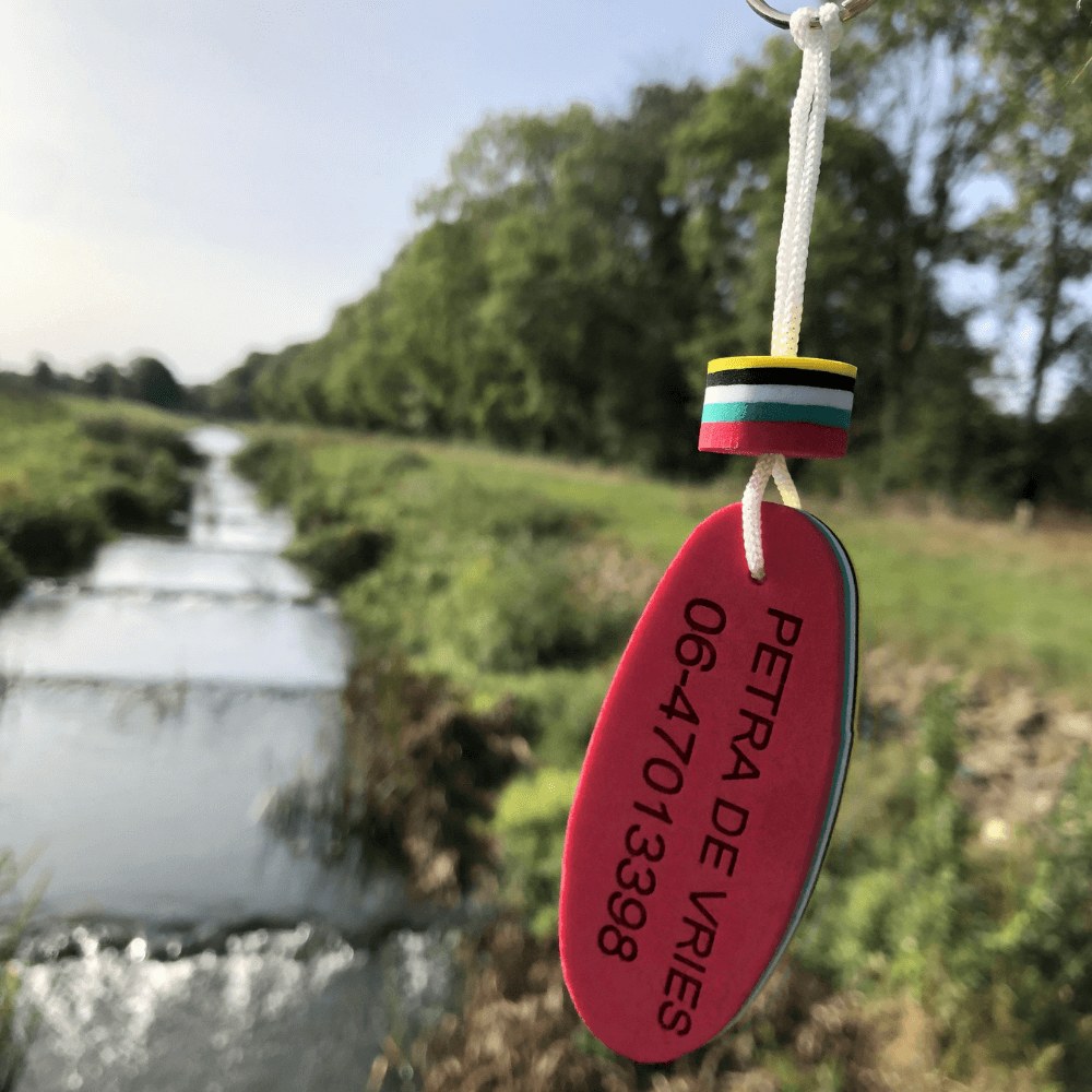 Floating keychain met naam en 06 erg handig